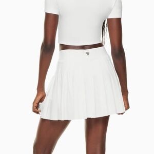 TNA Aritzia move tennis skirt white XS